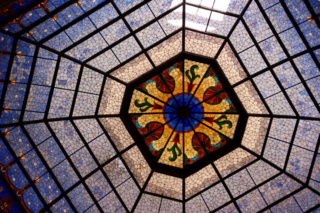 Colorful stained glass ceiling inside the Indiana state capitol building in Indianapolis. ©KettiWilhelm2019